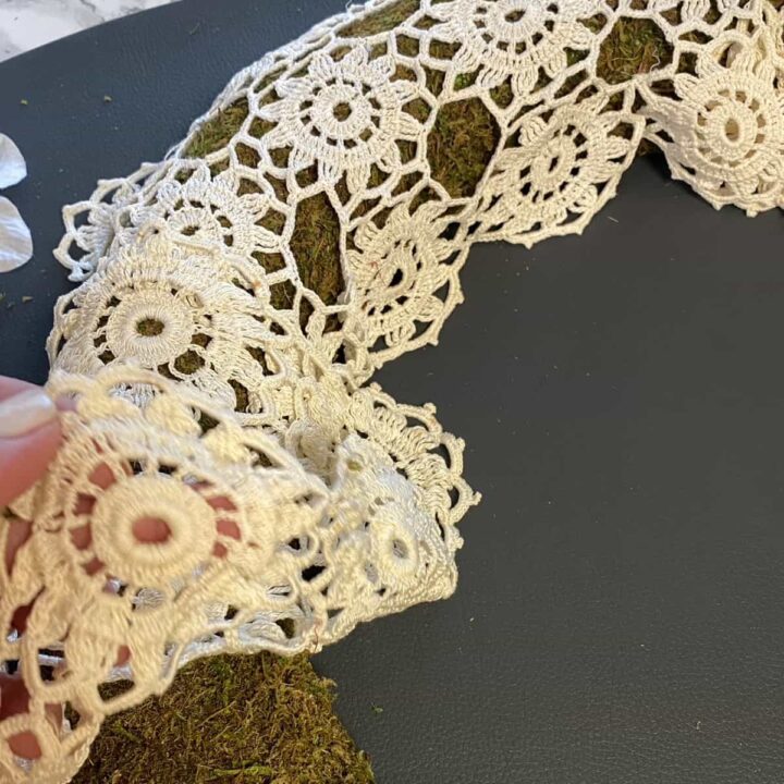Crochet Doily on top of moss