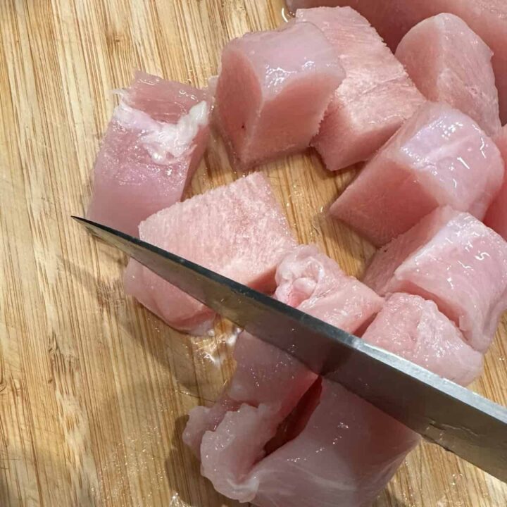 Cube up the chicken breast then add to slow cooker