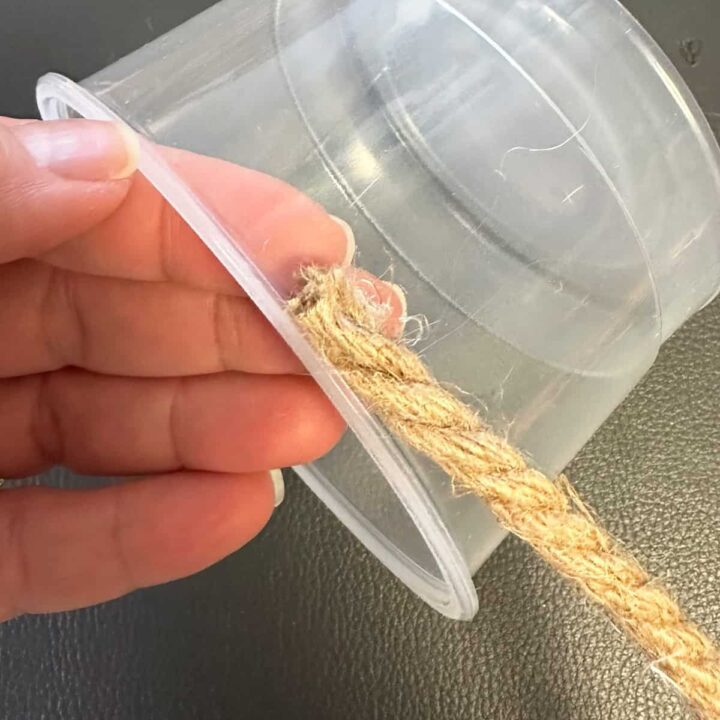 start adding the rope to top edge of container