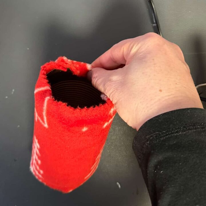 Fold top and bottom and hot glue to can