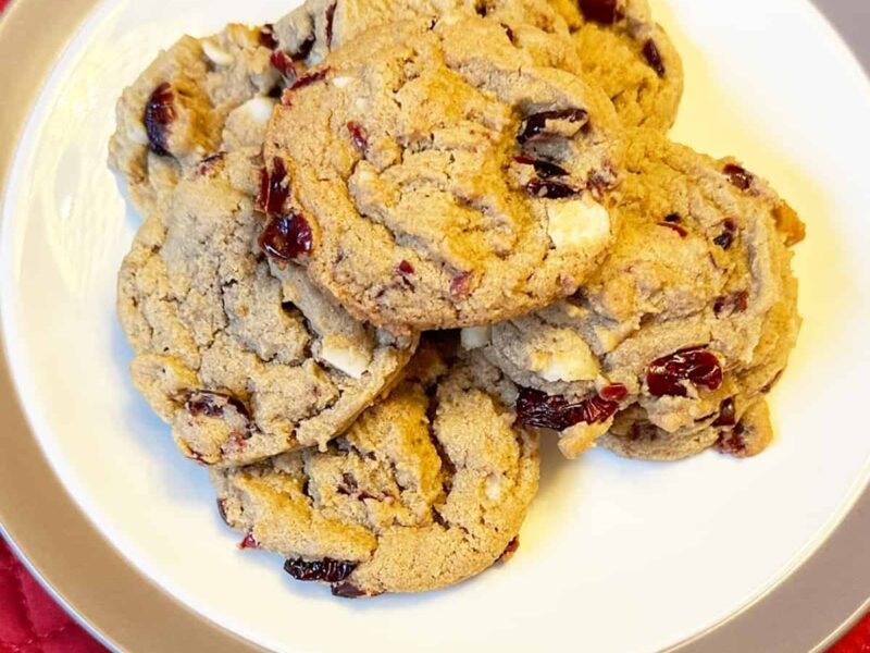 Gluten Free Dairy Free Cranberry and Macadamia Nut Cookies - Vegan version on a plate square image