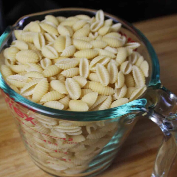 cavatelli pasta in a measuring cup