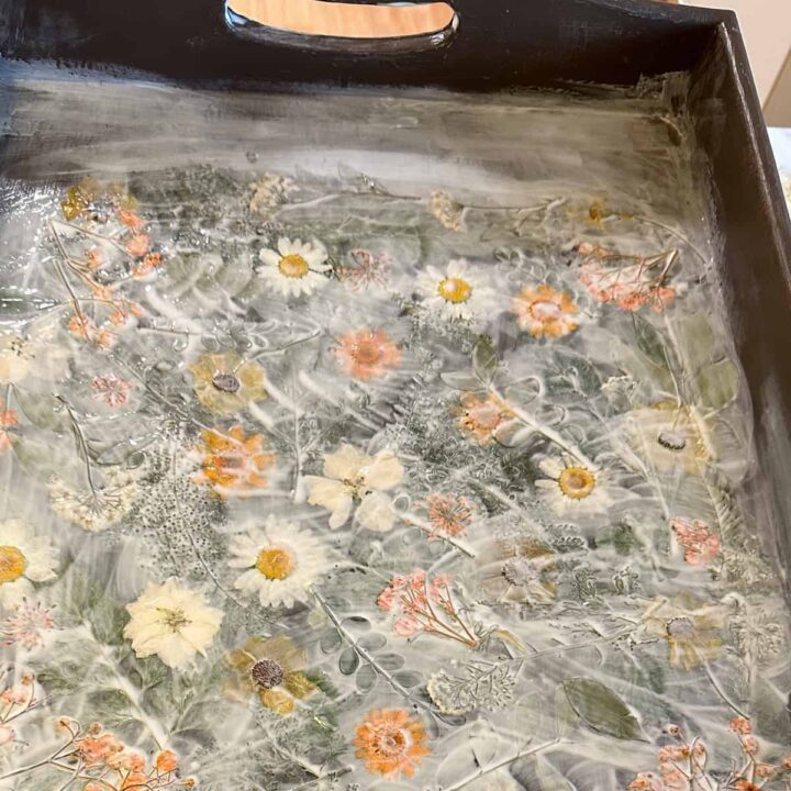 Add an extra thick layer of Mod Podge to the entire tray over the flowers and greenery