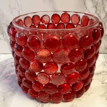 Red Gems glass container with gems glued on it