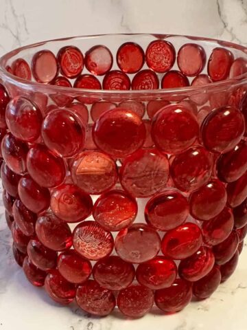 Red Gems glass container with gems glued on it