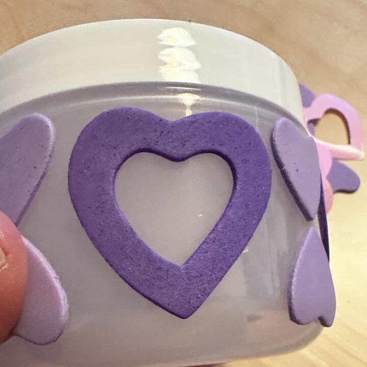 jar with large and small hearts on it