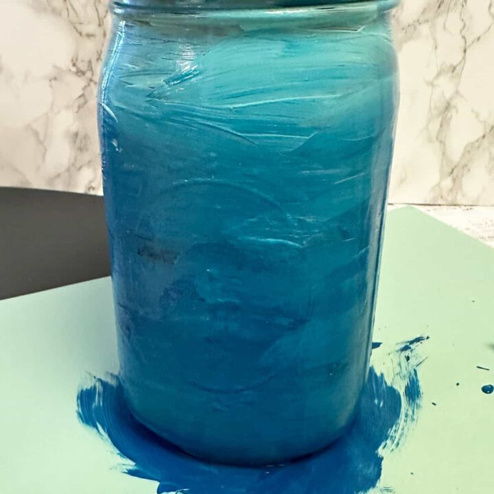 Finished painted mason jar from light to dark blue