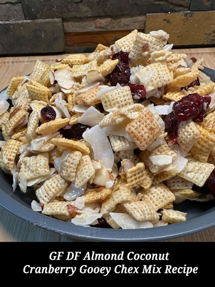 DF GF Coconut Almond Cranberry Chex Mix on a plate with the title of post overlay