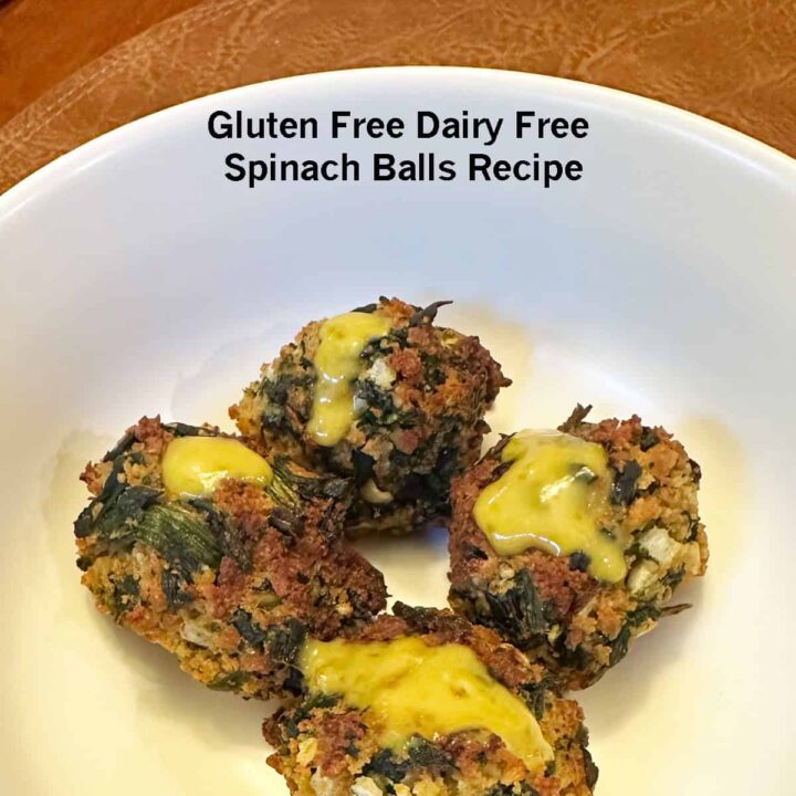 4 spinach balls in a white bowl with title overlay