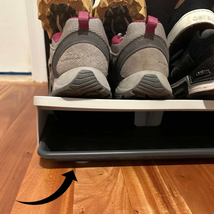 tray and shoes and tiered that are holding the shoes with an arrow showing the tray at the bottom