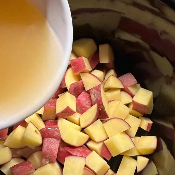 potatoes and broth in the slow cooker