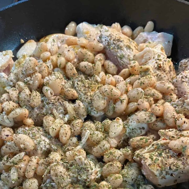 beans and seasoning on a skillet