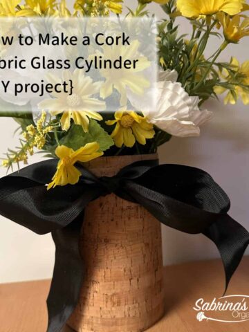 after photo with cork fabric, ribbon, silk yellow flower and title at the top left of image square size