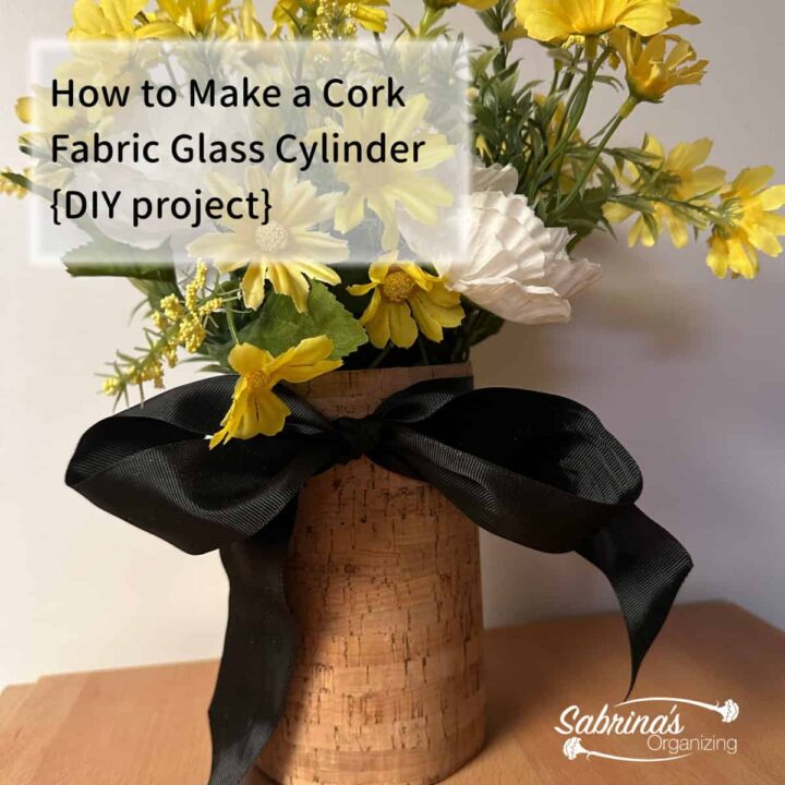 after photo with cork fabric, ribbon, silk yellow flower and title at the top left of image square size