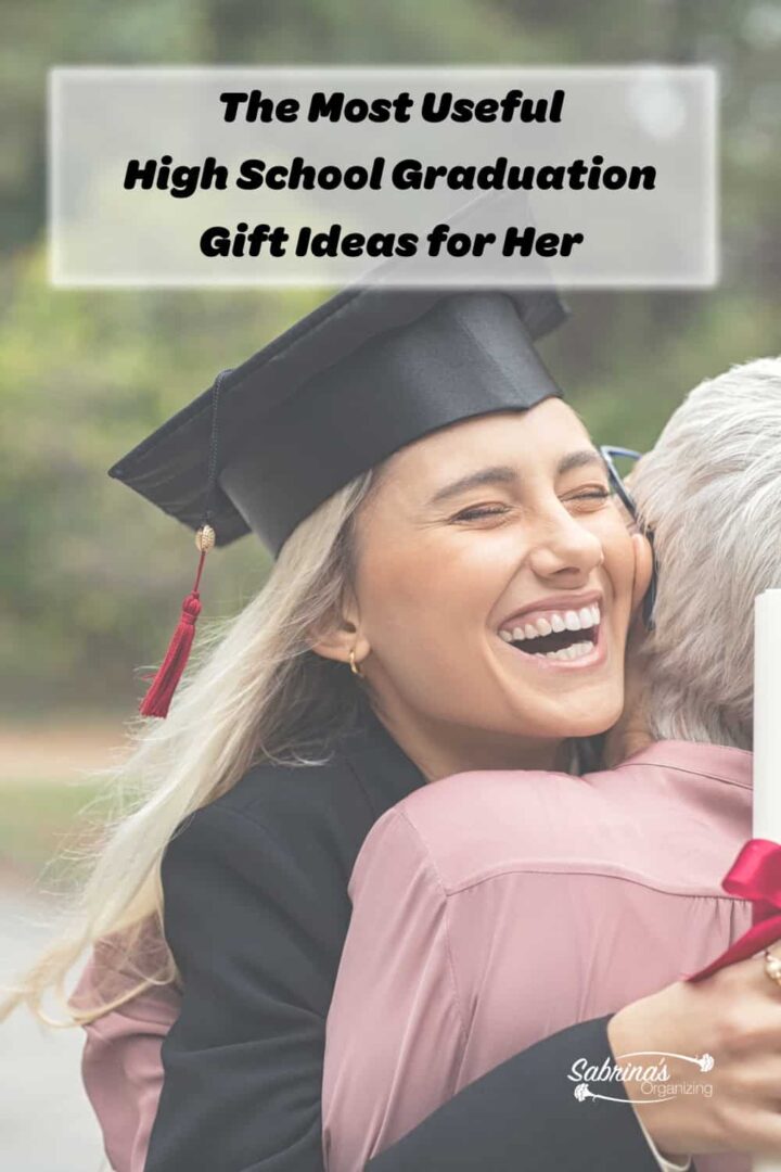 A female graduate with cap and gown smiling and hugging her grandma with the title of the post at the top center of Pinterest sized image