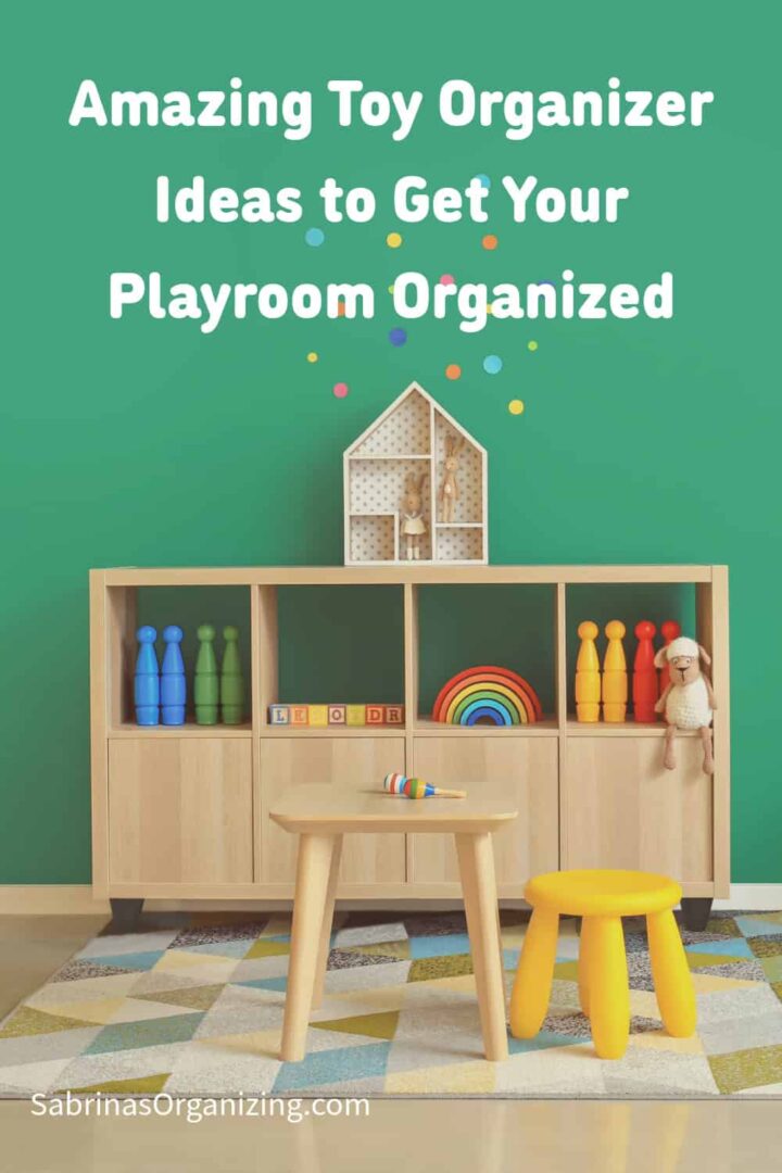Playroom with a light wood chest with bright color toys on the cubbies and a green background. The title of post is at the top middle. Pinterest sized image