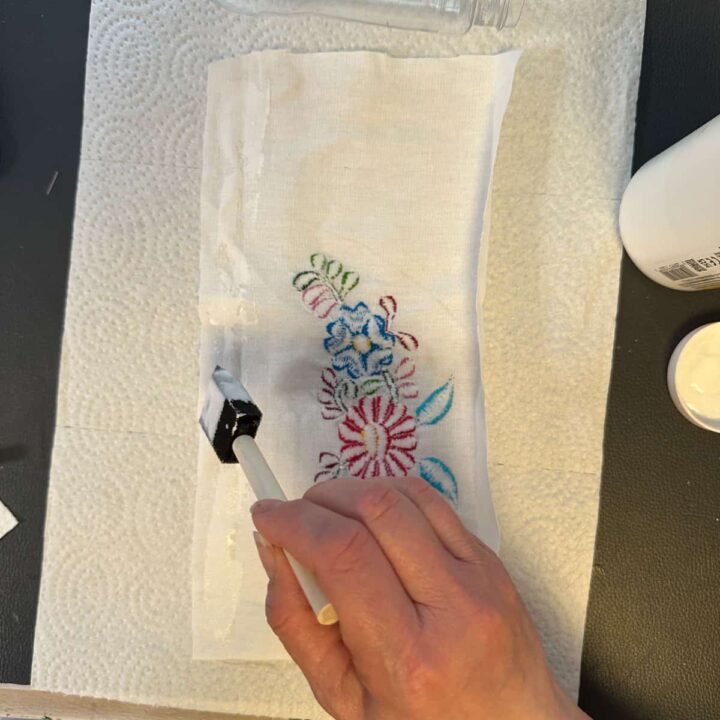 use mod podge and sponge brush to glue the folded area