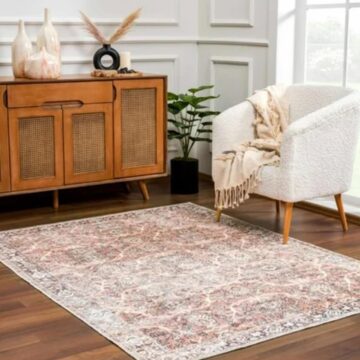 Heritage rug image from Boutique rugs - brown color with buffet table and white fabric chair