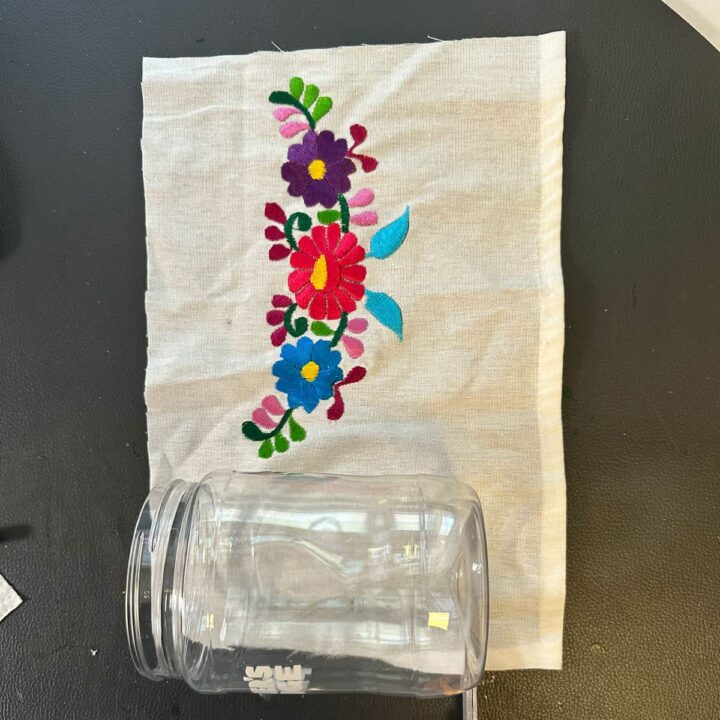 measure and make sure the embroidery is in the center of jar