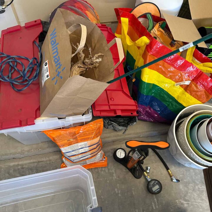 stuff on the floor sorted by item, bags, planting pots, etc.. .square image