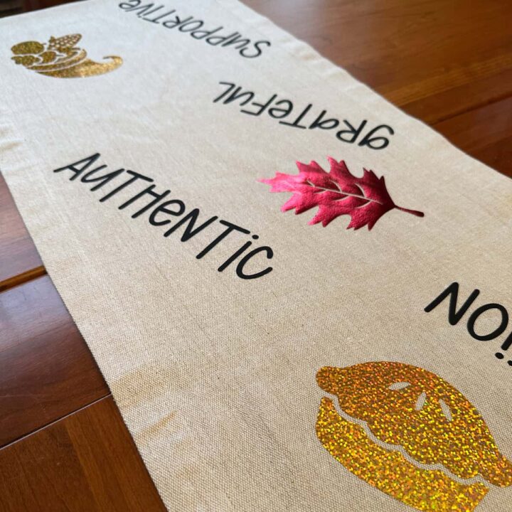 square image - finished runner - says authentic, grateful, supportive, has a pie, leaf, and cornucopia on the runner.