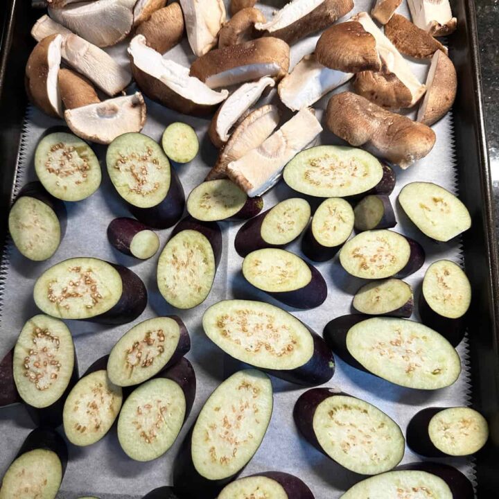 japanese eggplants and mushrooms on a baking sheet - square image
