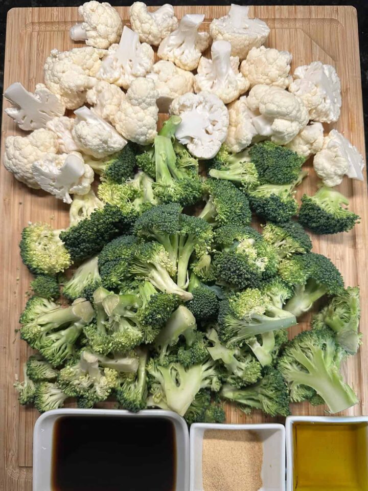 Broccoli and cauliflower and other ingredients listed in the blog on a cutting board pinterest iimage size