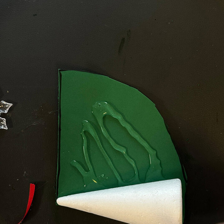 Add glue to back of felt and glue to white cone - square image