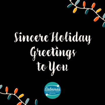 square image - christmas lights at the top right and bottom left corner - center says Sincere Holiday Greetings to you - sabrina's logo at the bottom center.