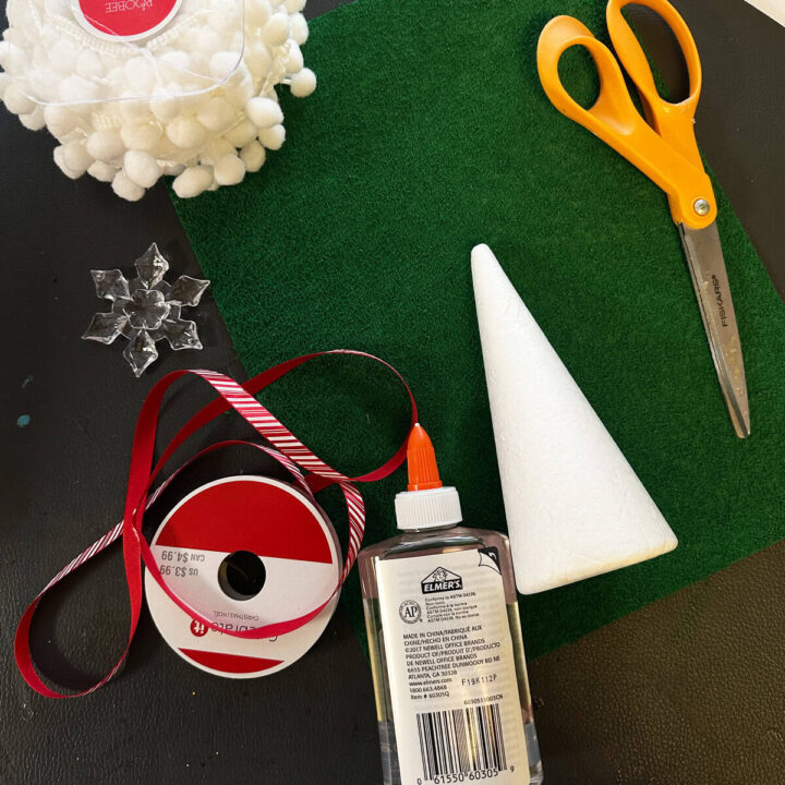 Supplies - that are in the post are in this image - glue, scissors, snowflakem, ribbons - square image