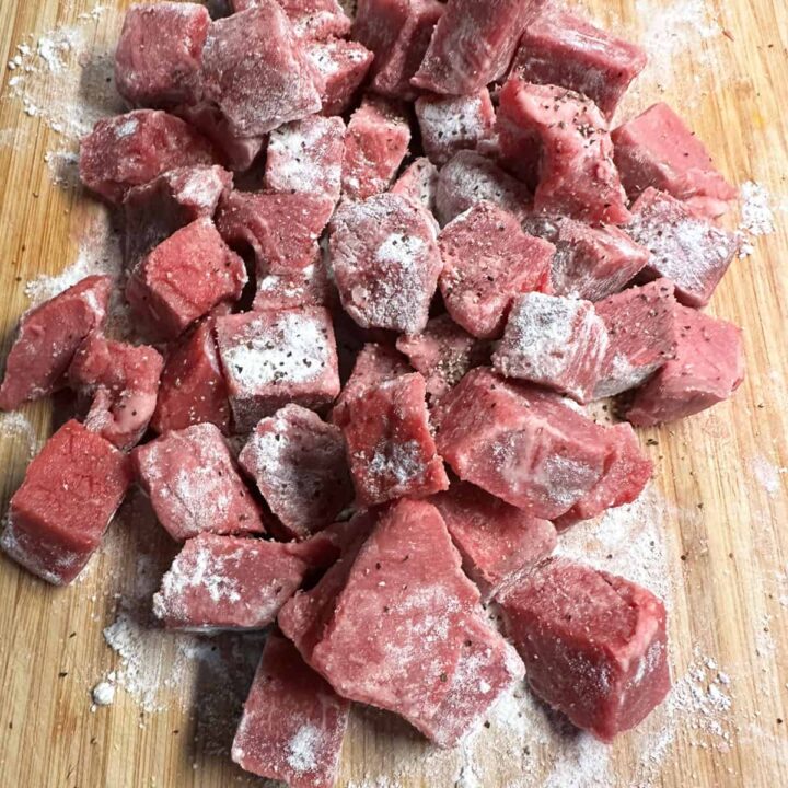 square image flour and meat on a cutting board