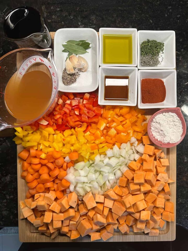 Supplies laid out on a cutting board ready to be cooked - pinterest image size.