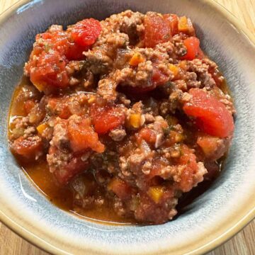 The finished dish in a bowl with the title at the bottom - pinterest image