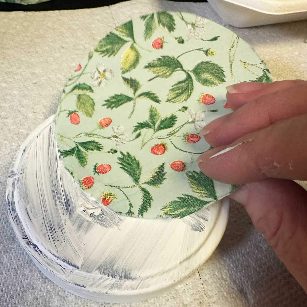 napkin circle over painted lid - square image