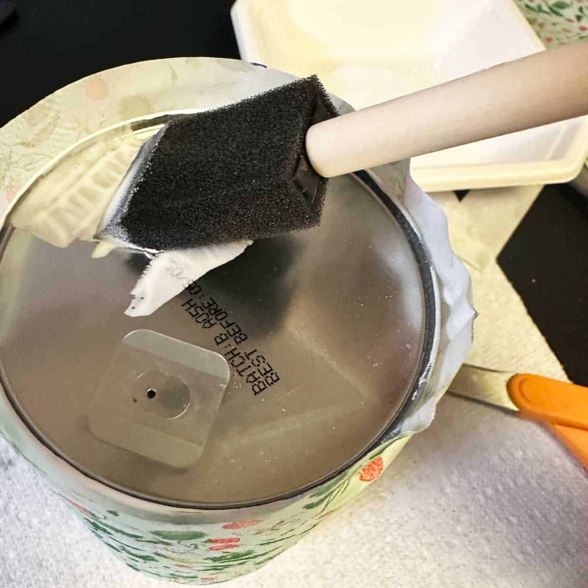 glue on bottom of coffee can - square image