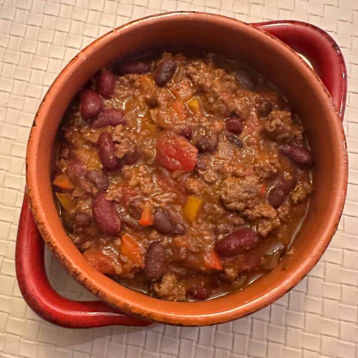 beef chili in a bowl with handles