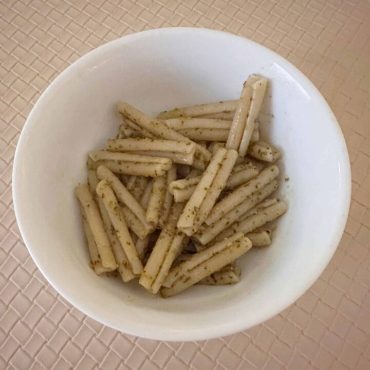Basil pesto with pasta in bowl