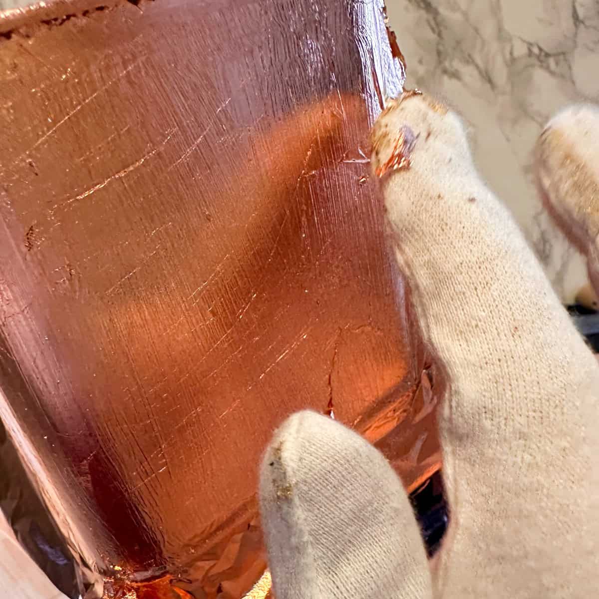 Add rose gold leaf to metal tin