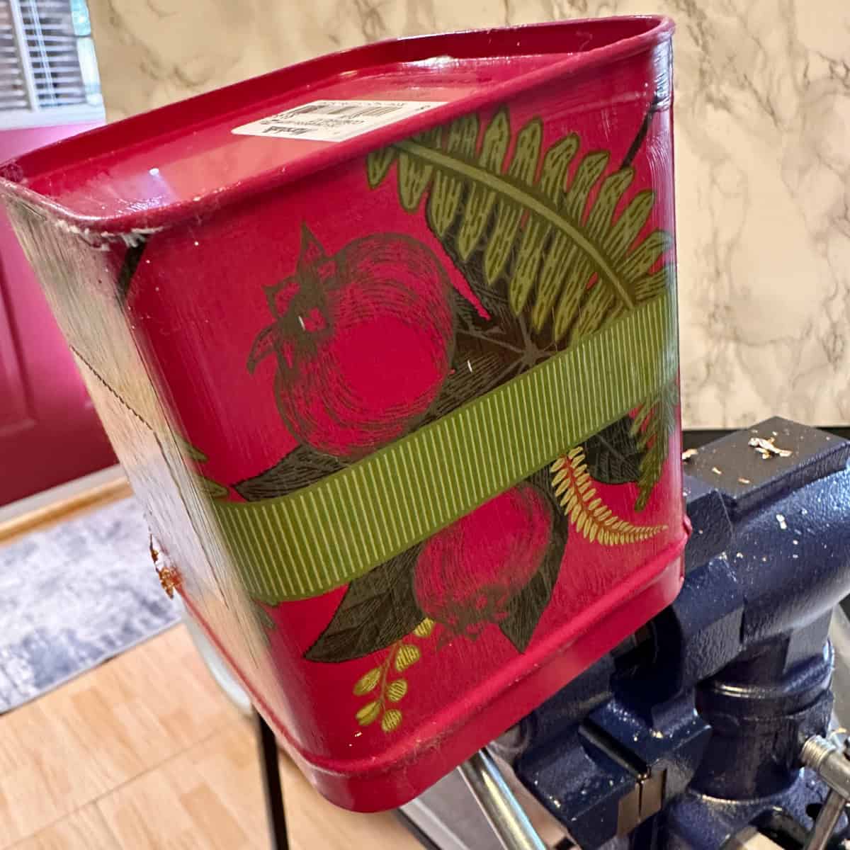 Drying glue on the tin box upside down